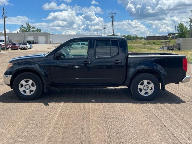 Used 2006 Nissan Frontier SE with VIN 1N6AD07W06C428822 for sale in Albert Lea, Minnesota