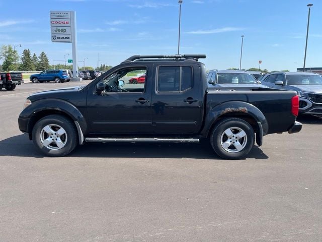 Used 2005 Nissan Frontier LE with VIN 1N6AD07W65C410288 for sale in Albert Lea, Minnesota
